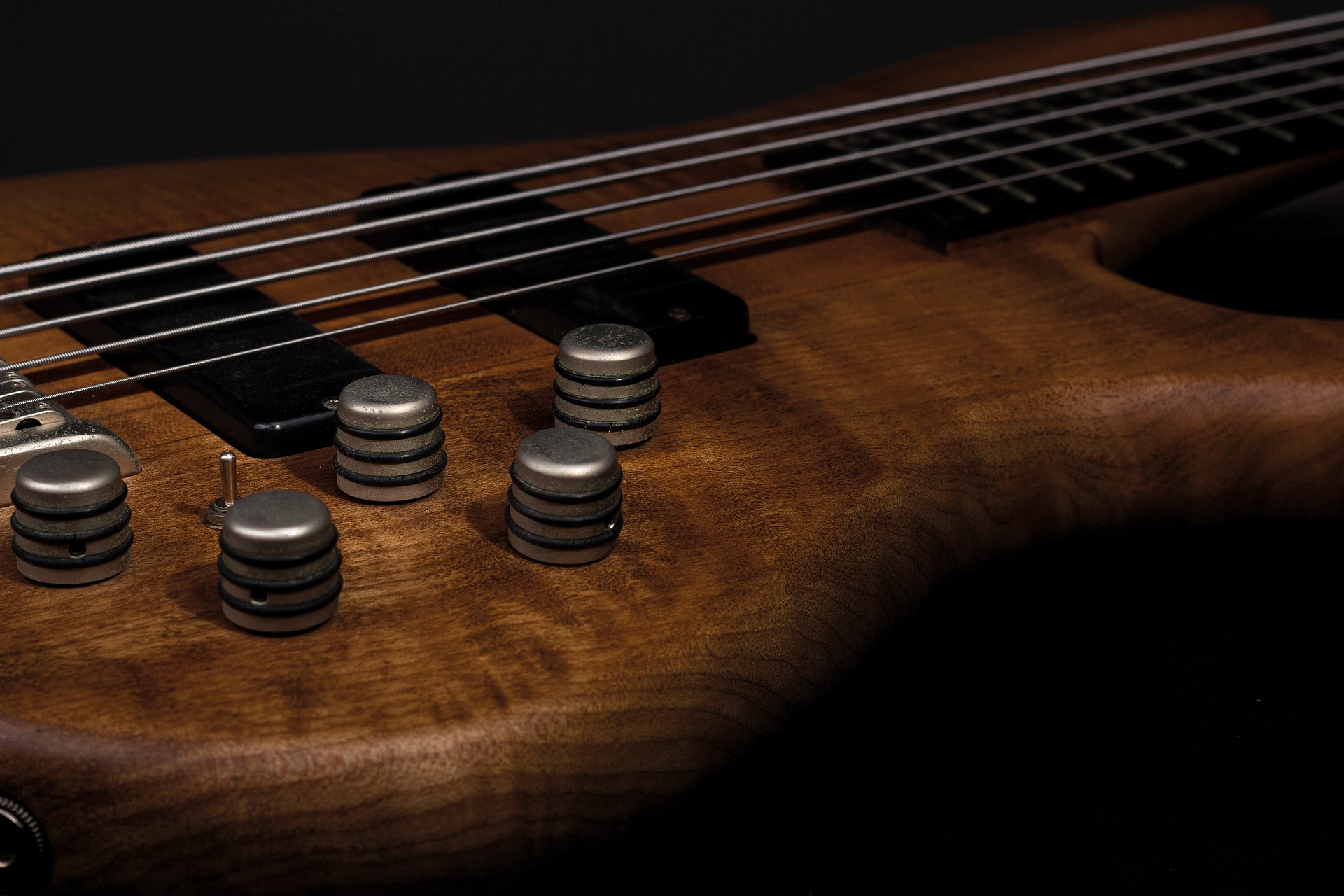 brown wood electric bass
